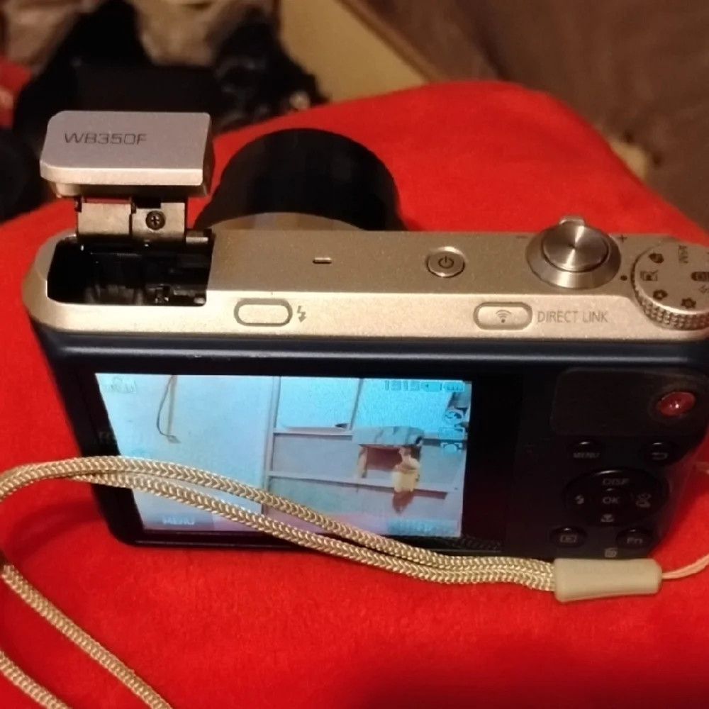 Samsung Blue and Silver Digital Camera with 21x Optical Zoom